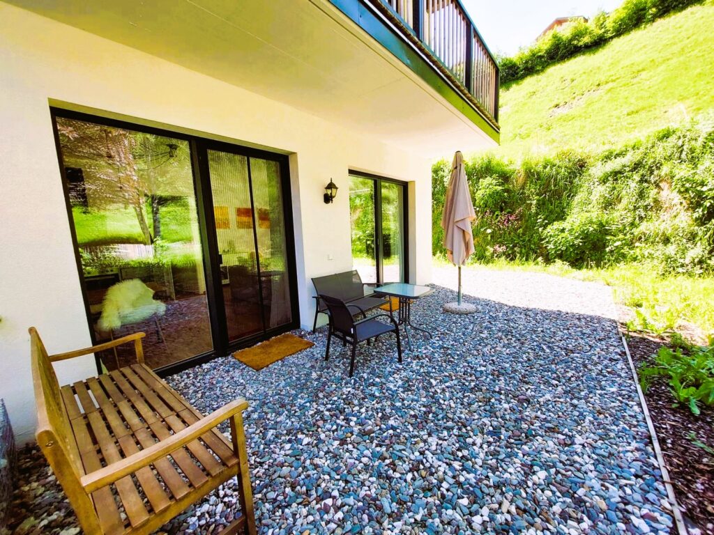 Aussenbereich Apartmenthaus Kitzbüheler Alpen wohnen